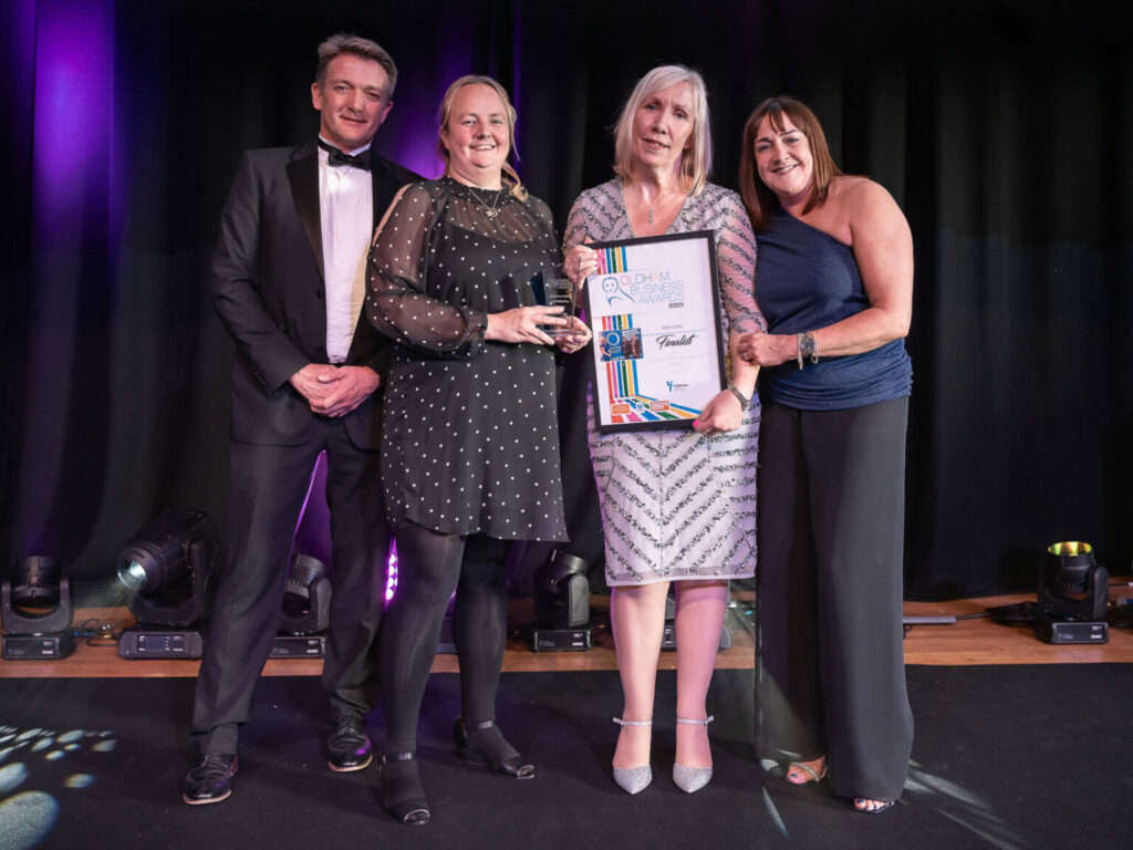 Oldham college claiming their workforce health and well being award Oldham college claiming their workforce health and well being award